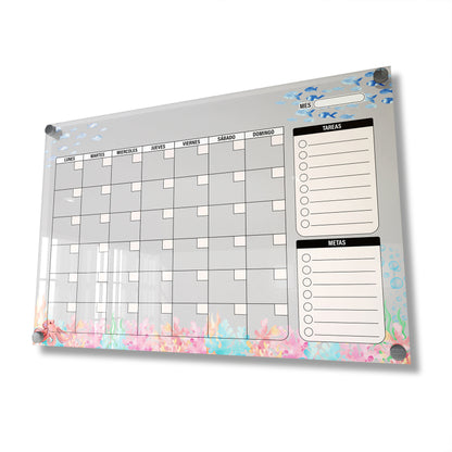 Planificador mensual de acrílico transparente con soportes de aluminio, diseño minimalista y reutilizable. Ideal para organizar tareas, metas y actividades. Incluye marcador borrable. Envío gratis en compras en línea.